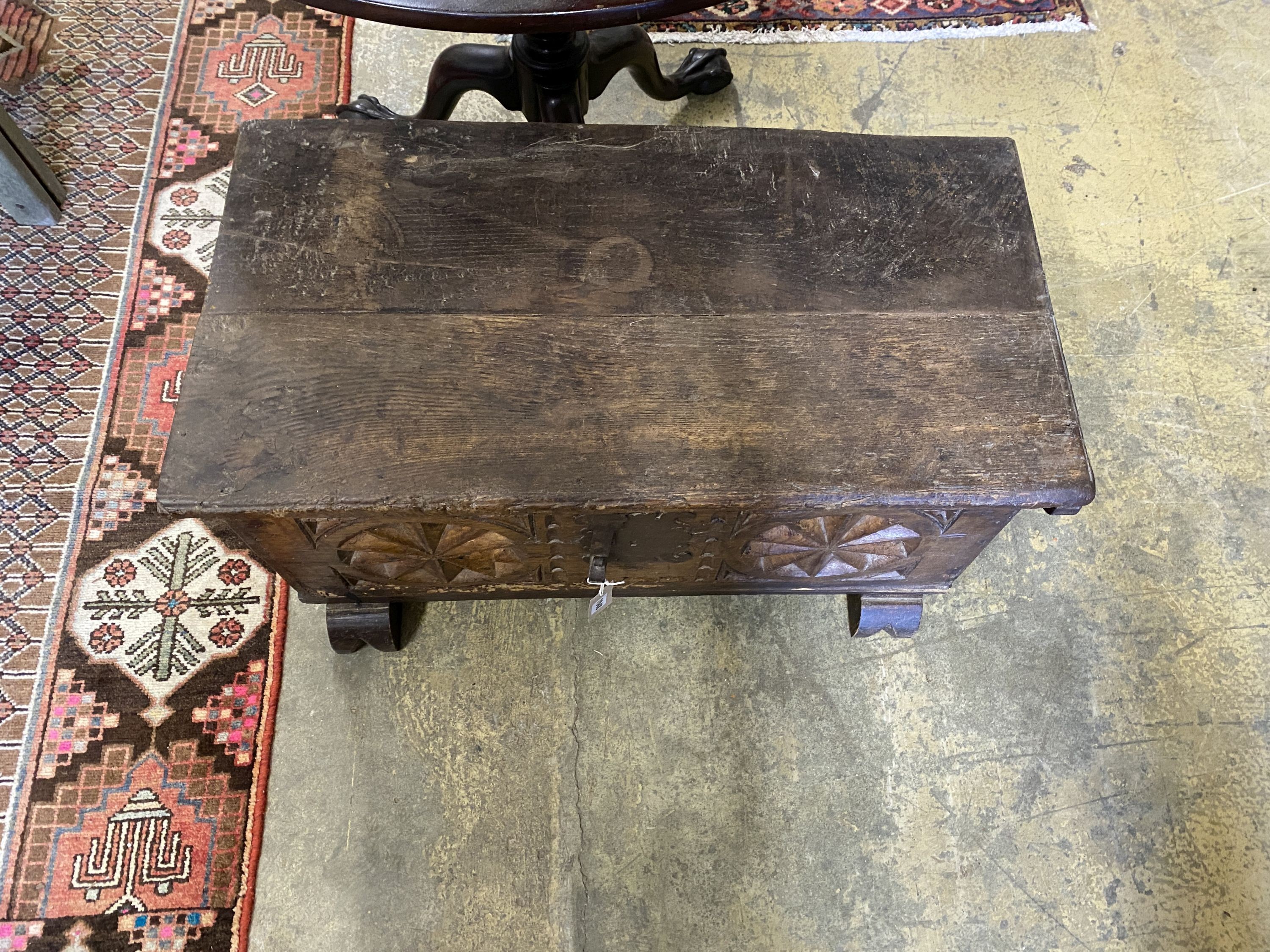 A 17th century and later Spanish oak coffer, length 86cm, depth 44cm, height 41cm